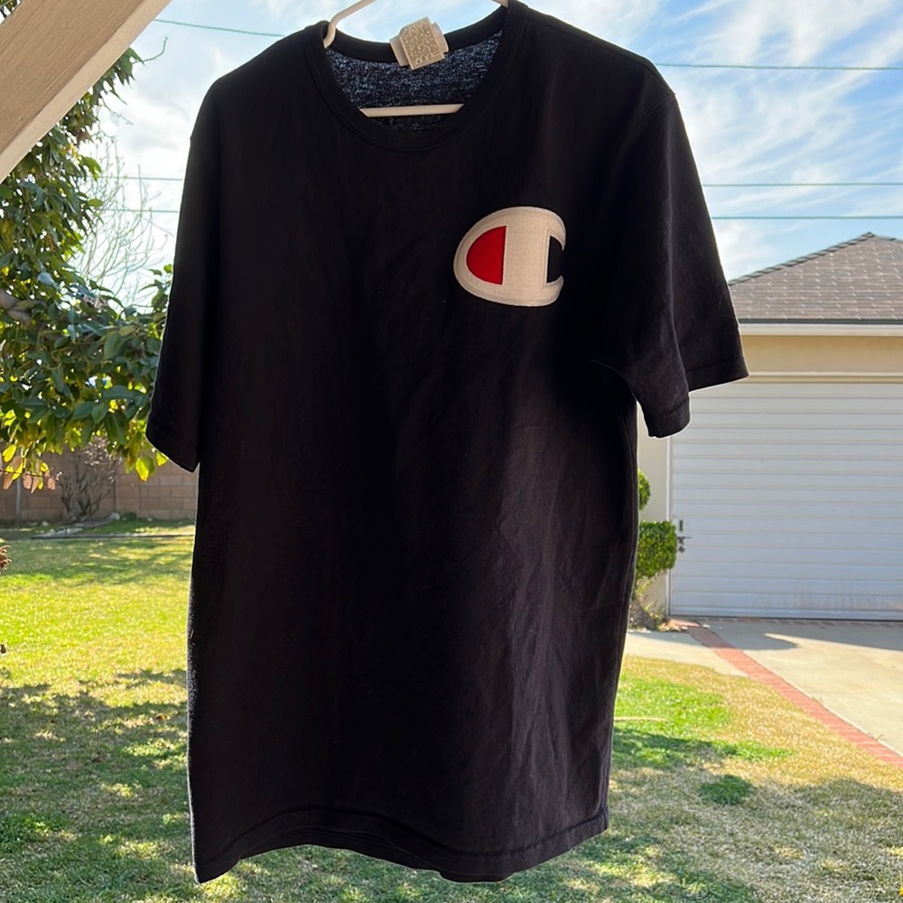 Champion Tee